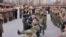 Северокорейский диктатор Ким Чен Ын приветствует ставших инвалидами солдат 528-го инженерного полка Корейской Народной Армии, вернувшихся из "зарубежной командировки в Курскую область России". Пхеньян, 12 декабря 2025 года
