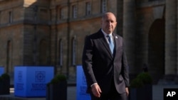 Bulgarian President Rumen Radev arrives for a summit in Oxfordshire, England, on July 18.