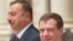 Azerbaijani President Ilham Aliyev (left) with his Russian counterpart, Dmitry Medvedev, in July. It is easy to see how Aliyev is calculating.
