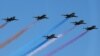 Armenian Su-25 combat aircraft fly during a military parade in Yerevan in September 2016.