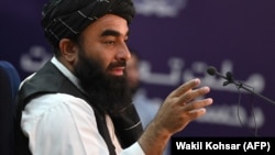 Taliban spokesman Zabihullah Mujahid speaks during a press conference in Kabul on September 6.