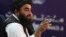 Taliban spokesman Zabihullah Mujahid speaks during a press conference in Kabul on September 6.