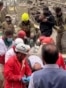 Iranian Emergency Workers Search For Survivors Trapped Under Rubble GRAB 2