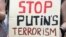 Плакат учасників акції протесту в столиці Австралії, 19 липня 2014 року