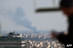 Smoke rises from the site of a strike in Tehran on April 1.