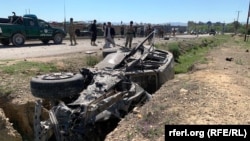 At least two bodyguards and 12 civilians were wounded in a roadside bomb attack on Governor Halim Fidai in the southeastern province of Khost.