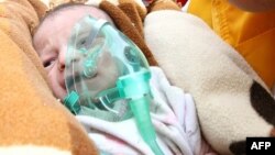 Спасенный младенец Азра Карадуман, Эрджис, 25 октября 2011