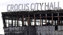 The burned-out Crocus City Hall outside Moscow on March 26, four days after a shooting attack at the venue left more than 140 people dead. Just weeks earlier, the United States had issued a warning to Russian intelligence agencies that a terror attack was "imminent," which was dismissed by Vladimir Putin as "outright propaganda."