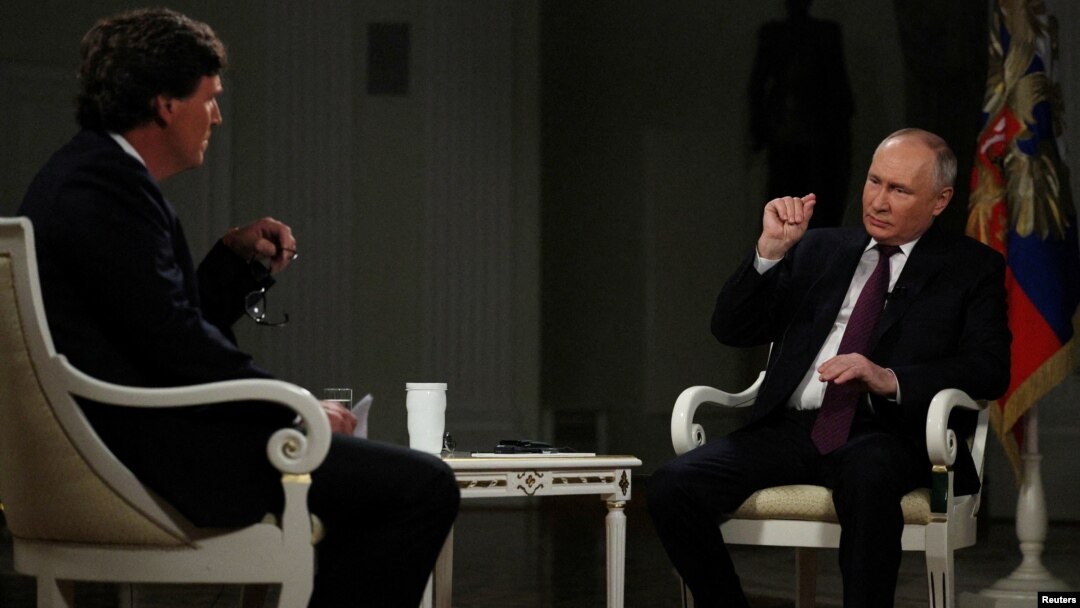 Владимир Путин и Такер Карлсон