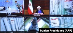 A screen grab from a videoconference showing views of centrifuges and devices at Iran's Natanz plant, as well as Iranian President Hassan Rohani delivering a speech, to mark Iran's National Nuclear Technology Day on April 10.
