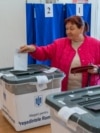 Moldova: Romanian election, vote in R. Moldova, people at polling station in Ialoveni