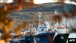 The "Arctic Sunrise" moored in the Murmansk harbor