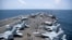 АКШнын Ормуз кысыгына жакын Араб деңизи аркылуу өтүп бара жаткан USS George Washington кемеси. 2026-жылдын 20-августу.