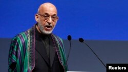 "The New York Times" reports that Afghan President Hamid Karzai (pictured) has requested a personal letter from U.S. President Barack Obama acknowledging U.S. mistakes in Afghanistan.