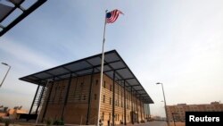 A U.S. flag flies inside the compound of the U.S. embassy in Baghdad (file photo).