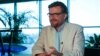 Russian journalist Yevgeny Kiselyov speaks during an interview with Reuters in Kyiv in 2018.