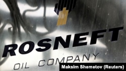 RUSSIA -- A logo of Russian state oil firm Rosneft is seen at its office in Moscow, October 18, 2012