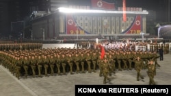 North Korean soldiers march during a parade held to mark the founding anniversary of the republic at Kim Il Sung square in Pyongyang.