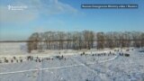 Russian Crews Comb Through Snowy Crash Site