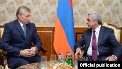 Armenia - President Serzh Sarkisain (R) meets with CSTO Secretary General Nikolay Bordyuzha, Yerevan, 6Oct2014.