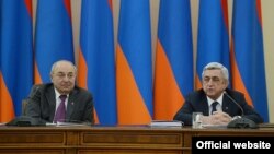 Armenia -- President Serzh Sarkisian (R) and chairman of the Public Council, Vazgen Manukian, hold a meeting in Yerevan, 14Mar2015