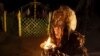 Russia -- A shaman, representing the so-called Adyg Eeren (Bear Spirit) society, together with its other members, participates in the so-called Kamlanie night ritual in the town of Kyzyl, Southern Siberia, Russia, October 9, 2015