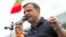  Andrei Nastase speaks at a protest in front of the government building in Chisinau after the invalidation of the mayoral election on July 2.