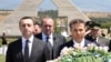 Some analysts fear that billionaire Bidzina Ivanishvili (right) may have something to do with tensions between Georgian Prime Minister Irakli Garibashvili (left) and the country's President Giorgi Margvelashvili (center -- file photo)