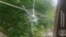 Armenia - A bullet hole on a window of a house in the border village of Khoznavar, May 29, 2025.