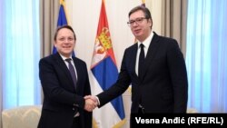 EU enlargement commissioner Oliver Varhelyi (left) met with Serbian President Aleksandar Vucic in Belgrade. 