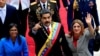 Presidenti i Venezuelës, Nikolas Maduro, i shoqëruar nga bashkëshortja e tij Cilia Flores dhe nga kryetarja e Asamblesë Kushtetuese Kombëtare, Delcy Rodriguez, në Karakas, Venezuelë, maj 2018.