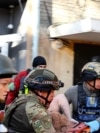 Ukrainian Woman Rescued After Russian Bombing Ukrainian Woman Rescued After Russian Bombing