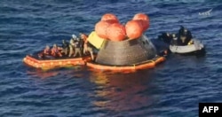 Эвакуацыя экіпажу пасьля пасьпяховага прывадненьня