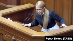 Yulia Tymoshenko calls for the impeachment of Ukrainian President Petro Poroshenko at a parliament session in Kyiv on February 26. 