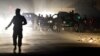 Afghan police officers work at the scene of an attack on foreign troops in Kabul in October.