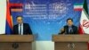 Iran - Iranian Roads and Urban Development Minister Abbas Akhoundi (R) and Armenian Transport Minister Gagik Beglarian at a news conference in Tehran, 20Jan2016. 