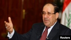 Ирак премьер-министрі міндетін атқарушы Нури әл-Малики.