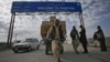 A Pashtun man passes the Pakistani-Afghan border crossing in Chaman, a border that Afghanistan believes is no one's business but the Pashtuns'.