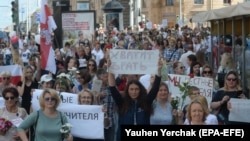 Belarusian teachers attend a rally in support of the opposition and against police brutality and the results of the presidential election in Minsk on August 14.