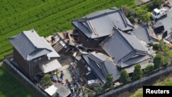 Case prăbușite la Hikawa, prefectura Kumamoto, pe 29 iulie 2026.