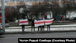 Imagine de la „Marșul vecinilor”, protest îndreptat împotriva lui Alexandr Lukașenko, care a avut loc, duminică, în mai multe orașe din Belarus.