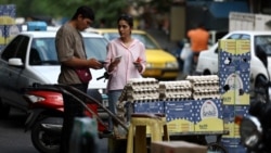 An Iranian woman buys eggs in Tehran. (file photo)