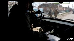 Сепаратисти в захопленій ними частині Широкина, фото 20 березня 2015 року