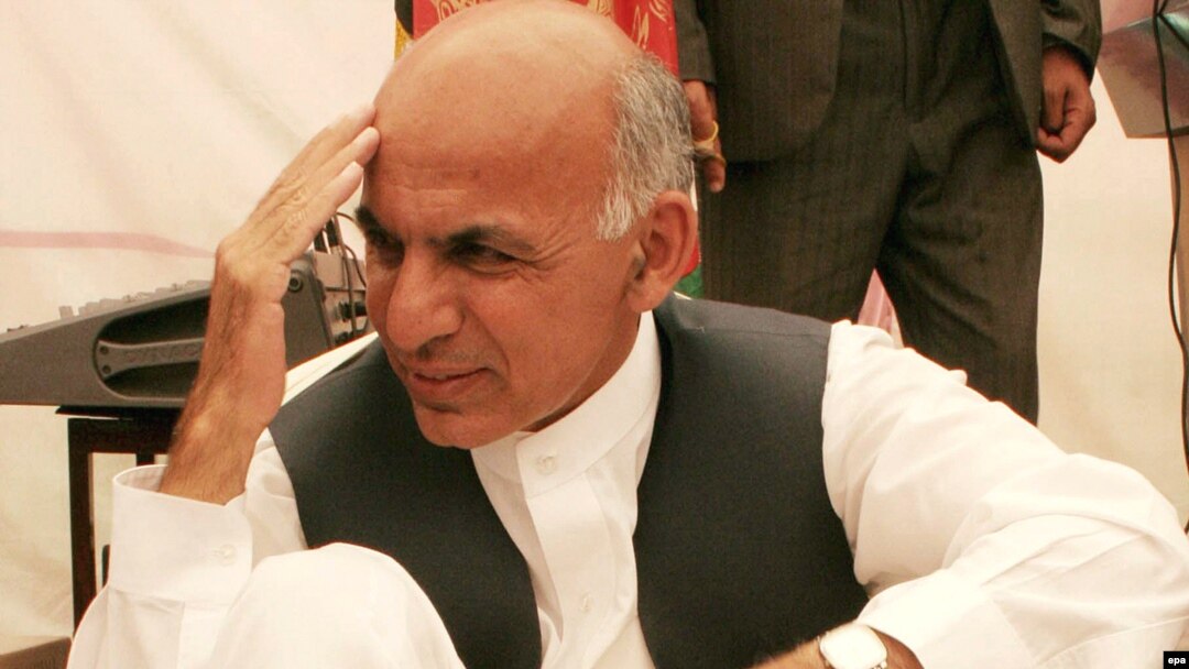 Presidential candidate Ashraf Ghani speaks to supporters in Kabul in June.