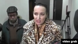 Tatyana Shevtsova-Valova speaking to journalists at her trial earlier this year. 