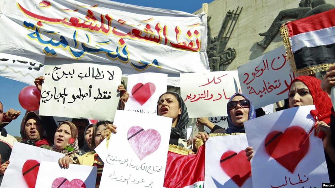 Iraqi women demonstrate against the lack of basic services in central Baghdad on February 14.