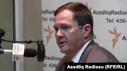 U.S. Assistant Secretary of State Thomas Melia in RFE/RL's Baku bureau in April 2013