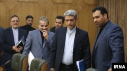 Center, Ali Tayebnia, minister of economy, to his right, Mohammad Baqer Nobakht, Management and Planning Organization of Iran and Valiollah Seyf, head of Iranian Central Bank, who was recently sacked. Oct 17th. Tehran.