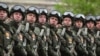Russian servicemen, who had been fighting in Ukraine, march on Red Square during the Victory Day military parade in Moscow on May 9.