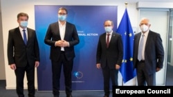 Specijalni predstavnik EU za dijalog Miroslav Lajčak, predsednik Srbije Aleksandar Vučić, premijer Kosova Avdulah Hoti i šef evropske diplomatije Žozep Borelj u Briselu 7. septembra 2020.